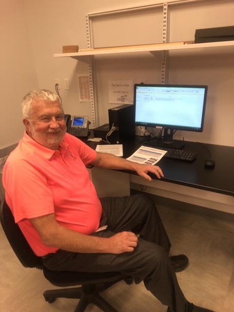 Dwight Bollinger, M.D., volunteering at our Offutt laboratory.